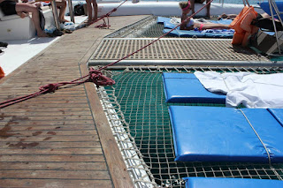 Trampoline net, I love laying here, listening to the waves against the hule.