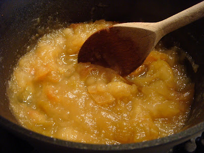 simmering apples in cider