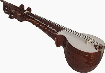 Trigon is a traditional musical instrument played western Java by swiping two strings