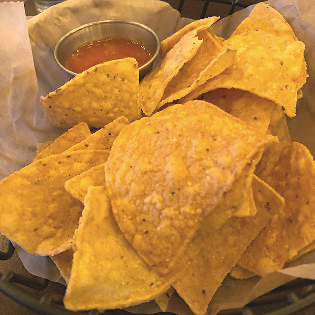A lovely basket of fresh chips and salsa for a little noshing.
