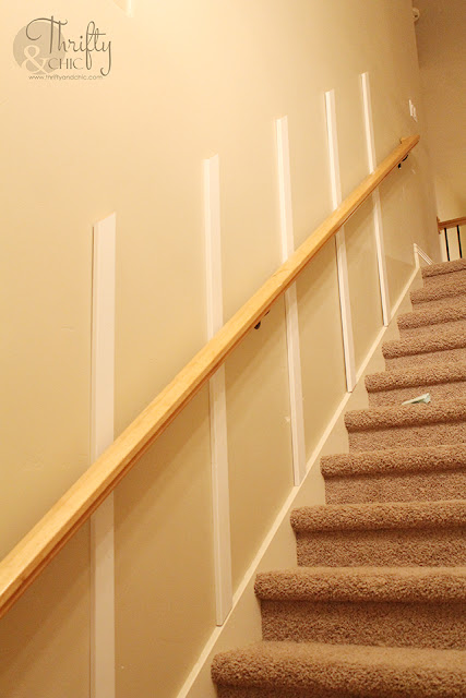 DIY board and batten staircase makeover. DIY stair makeover. How to hang board and batten on stairs. Staircase board and batten tutorial. Staircase ideas. Entry way decor and decorating ideas. Staircase decor and decorating ideas. Two story entryway ideas. Two story entry way ideas.