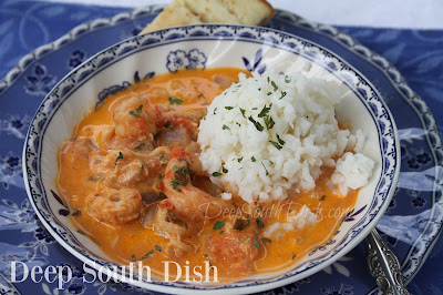 A creamy tomato-based stew with shrimp, crawfish and crab and served over hot, steamed rice.