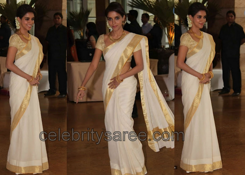 South Indian actress Asin in white kerala traditional silk sari with gold
