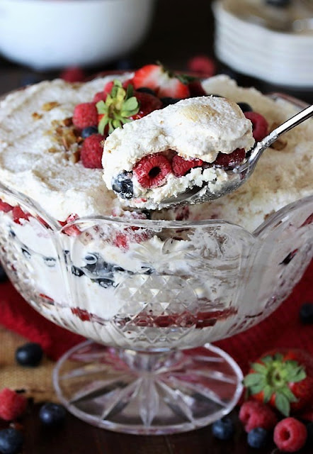 Serving Triple Berry Punch Bowl Cake Image