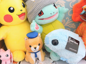 A selection of kawaii plush toys, ranging from pokemon to a water bear plush from Firebox