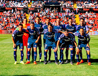 REAL VALLADOLID C. F. Temporada 2018-19. Masip, Ünal, Míchel, Calero, Sergi Guardiola y Kiko Olivas. Óscar Plano, Alcaraz, Javi Moyano, Waldo y Nacho. RAYO VALLECANO DE MADRID 1 REAL VALLADOLID C. F. 2. 12/05/2019. Campeonato de Liga de 1ª División, jornada 37. Madrid, España, estadio de Vallecas (10.040 espectadores). GOLES: 0-1: Enes Ünal, de penalti (6’). 1-1: Álvaro Medrán (73’). 1-2: Sergi Guardiola (80’).