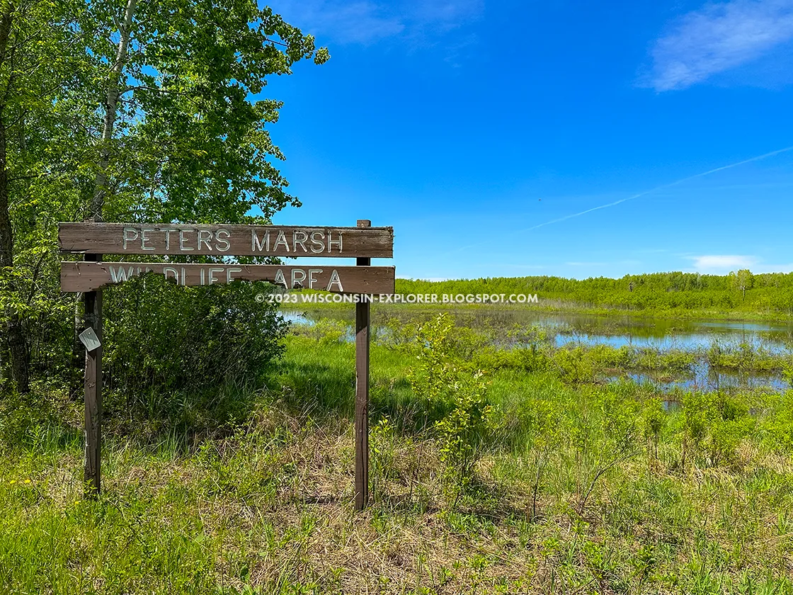 broken wood sign for peters marsh