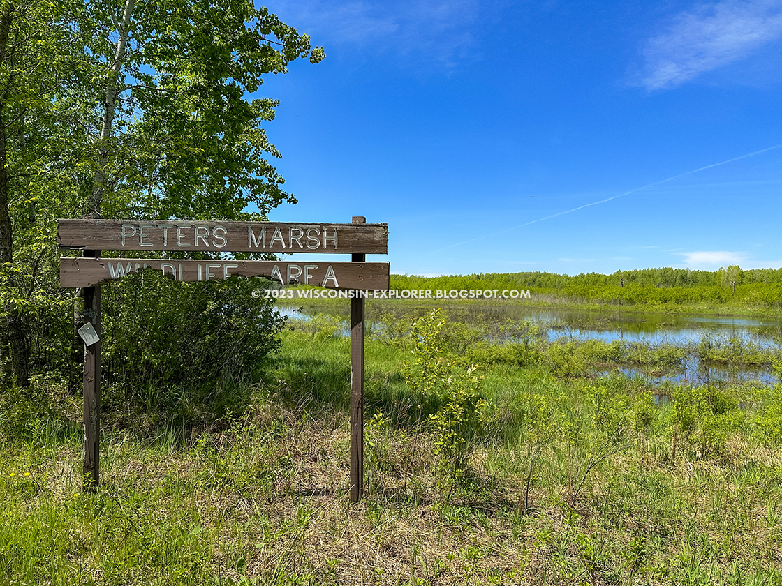 broken wood sign for peters marsh