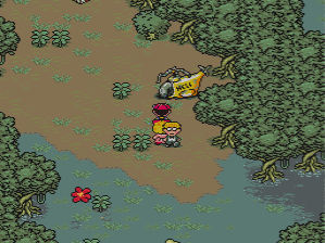 The party discovers Pokey's crashed helicopter in Deep Darkness, a location in EarthBound.