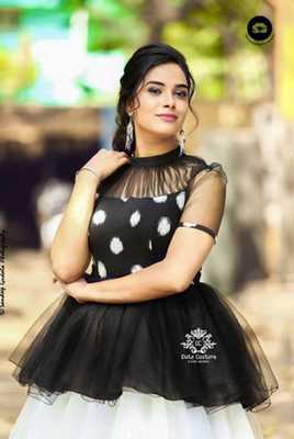 Hari Teja hot images in black transparent dress 