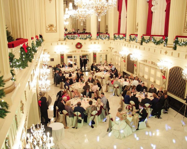 extraordinary-indoor-christmas-formal-traditional-wedding-decor-with-round-dining-table-crystal-chandelier-long-red-curtain