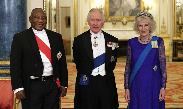 The Princess of Wales wore a Jenny Packham gown and Lover Knot tiara. Queen Consort wearing her Belgium Sapphire Tiara