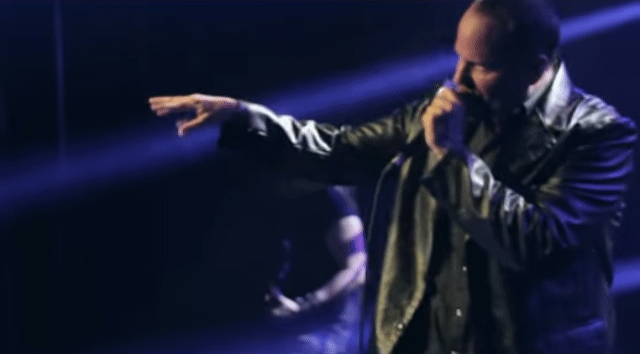 5/9 Beefy Rock Star Sporting Sexy Black Leather Blazer And Vest On Stage At Club