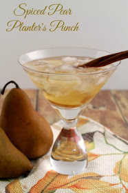 Sweet fresh pears and spiced rum come together in this perfect for fall Spiced Pear Planter's Punch.