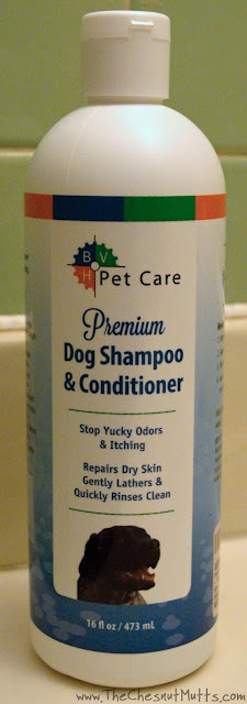 A bottle of BVH Pet Care Premium Dog Shampoo & Conditioner for bathing dogs