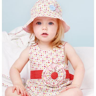 little girl in party dress and hat