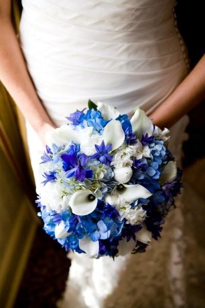 Blue hygrangea delphinium and white calla lily bouquet