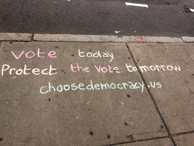 Writing on sidewalk Vote today/Protect the vote tomorrow/chooseemocracy.us