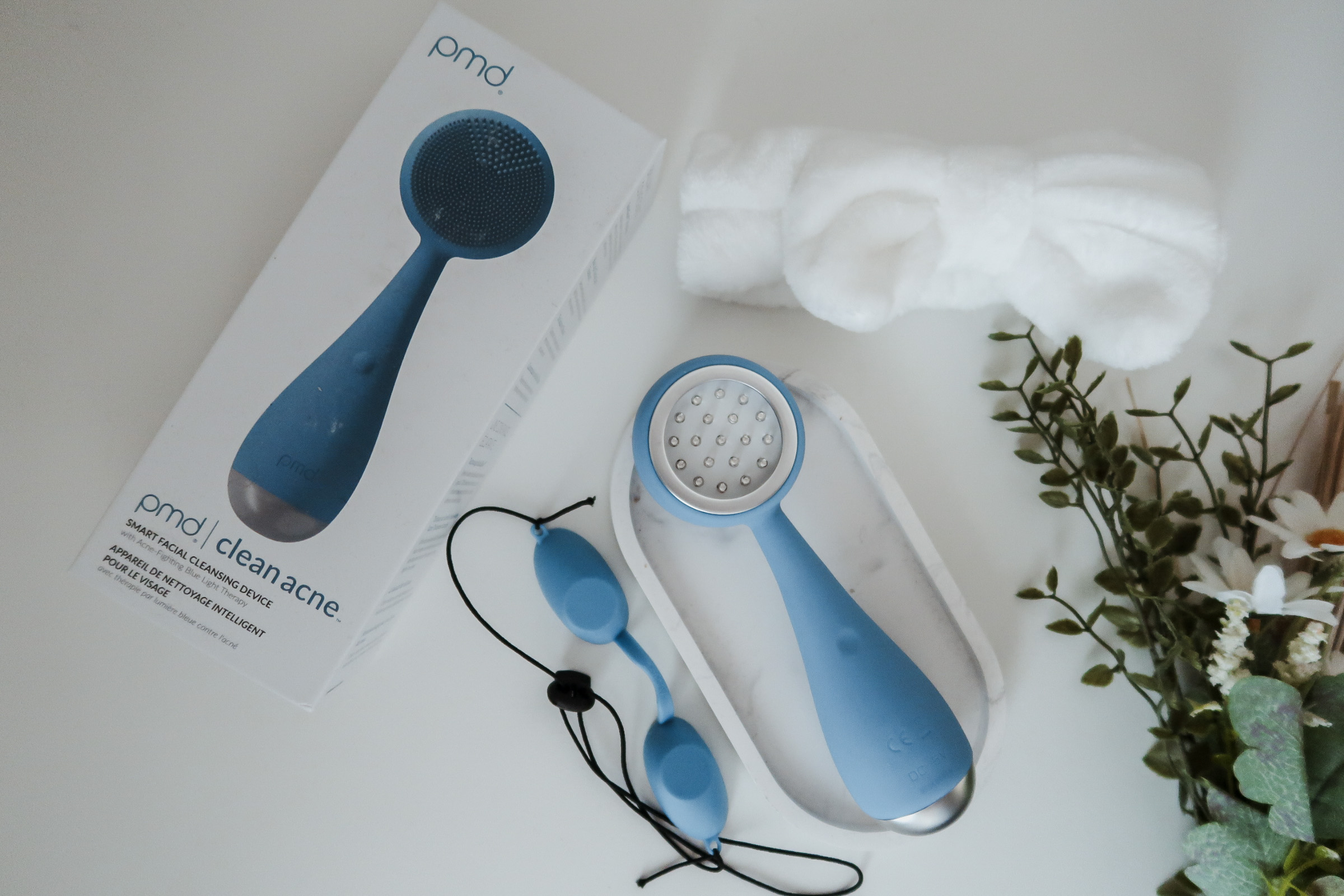 PMD Clean Acne smart facial cleansing device.