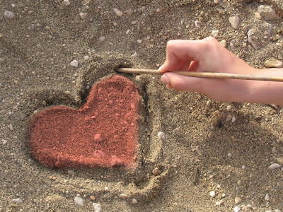 Making Painting Heart On Beach