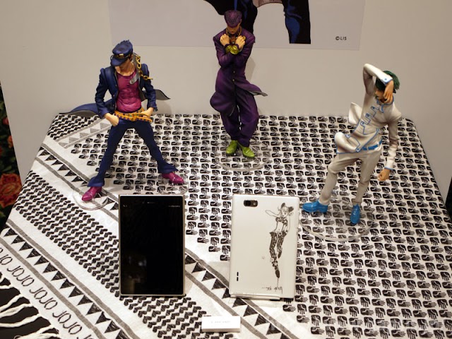 ジョジョスマホ「L-06D JOJO」の各種プロモ企画が開始へ。7月28日にプロモサイト公開。ジョジョ語マスター決定戦「JOJOGO BATTLE」や「オーソン」などでの実機展示も実施