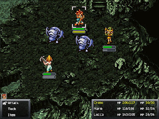 The team battle a pair of Rhino Weevils inside Heckran Cave, a dungeon in Chrono Trigger.
