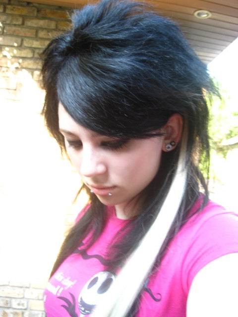 emo girl with black and blue hair. Scene hair color in the year