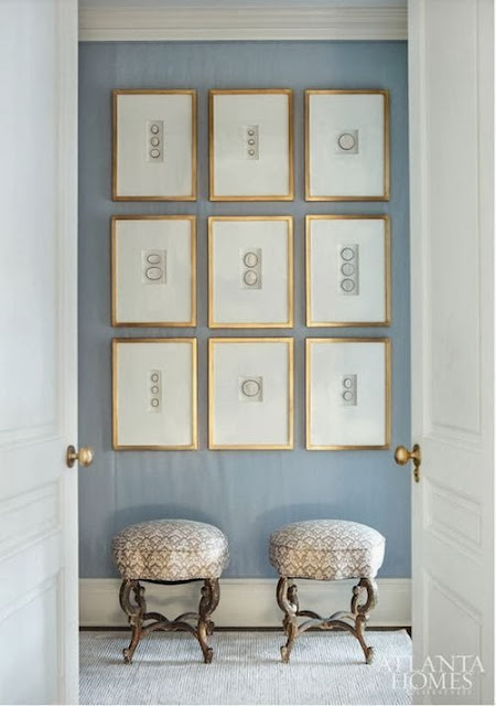 gold intaglio gallery wall