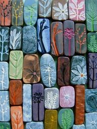 Make beautiful designs of flowers and plants on clay by yourself