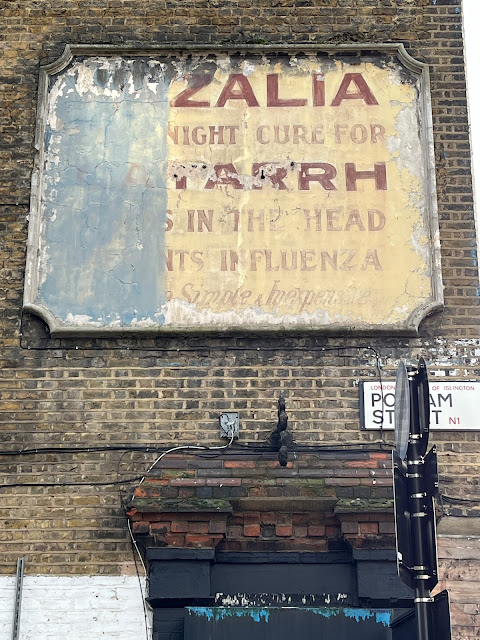 Old sign for X-Zalia catarrh treatment, Essex Road, Islington, North London, N1