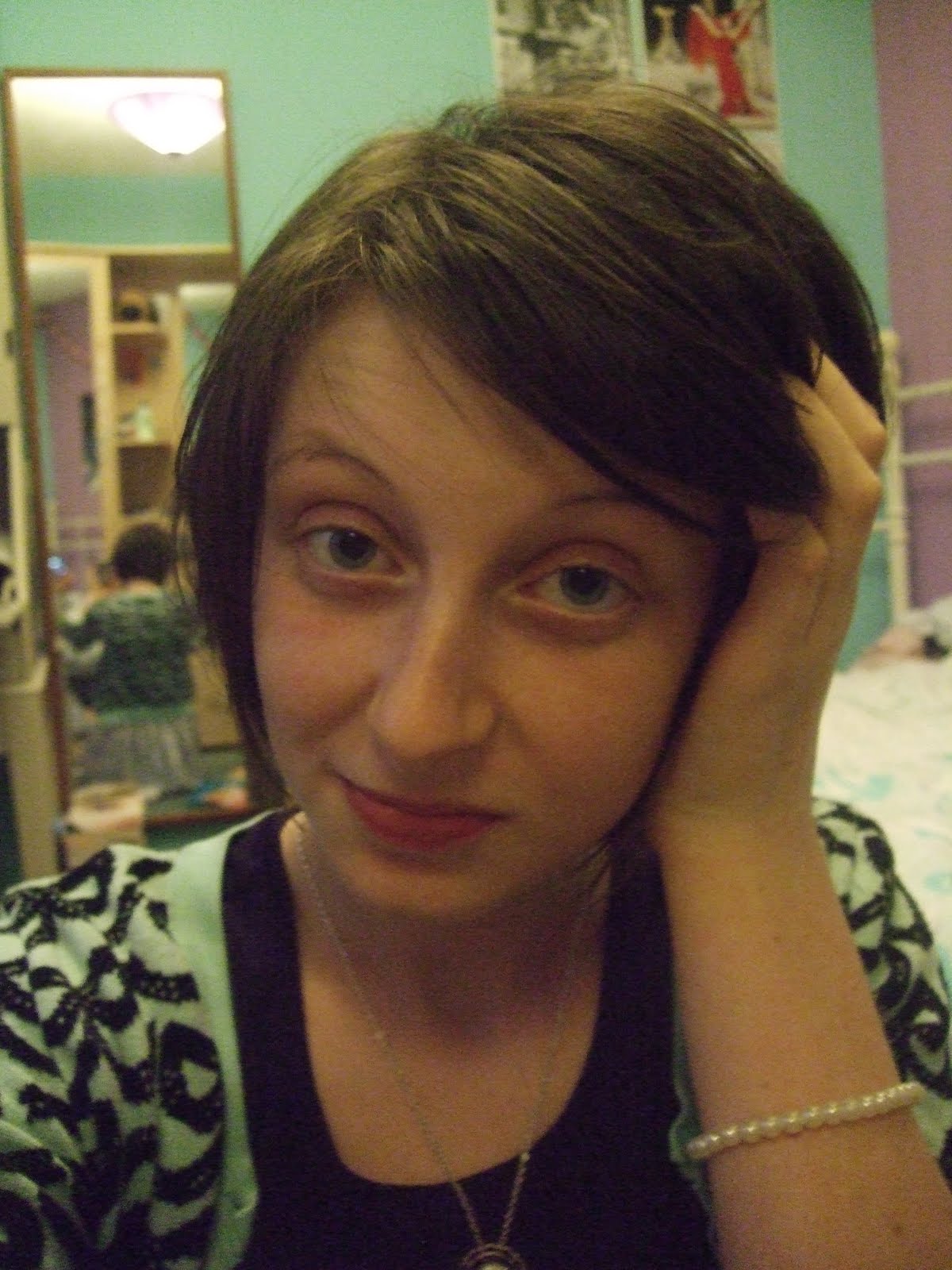 see, i like the fringe pinned back but it just won't stay that way  title=