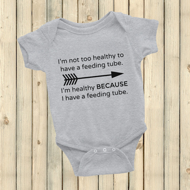 I'm Healthy BECAUSE of My Feeding Tube shirt from Sunshine and Spoons