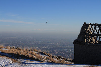 View back over the Po River Valley toward the southwest. A glider climbing on the currents.