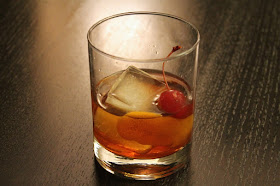 Old fashioned with bacon-infused bourbon and maple