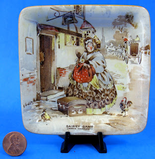 https://timewasantiques.net/products/sairey-gamp-dickens-pin-dish-new-hall-teabag-caddy-1930s-trinket-dickensware?_pos=4&_sid=91cc17960&_ss=r