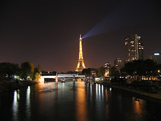 The Eiffel tower and the Seine at night