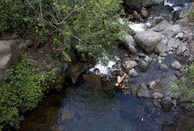 this boy is jumped from 40 ft tall bridge.