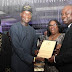 Governor Akinwunmi Ambode presents gift to Fashola at Law dinner 