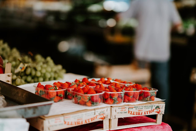 Photo by Annie Spratt on Unsplash- strawberry punnets in Venice