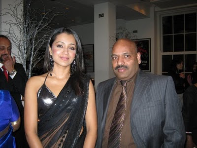 Trisha in Black transparent saree with bikini style blouse