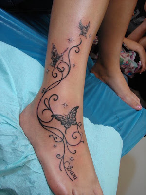 Butterfly henna tattoo design on foot women. Henna Tattoo Design on Foot