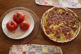 Zucchini pie and tomatoes