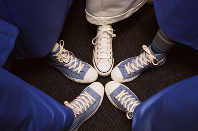 Walking around, dancing, and kung-fu fighting were all made super comfy by the standard uniform of Chucks.