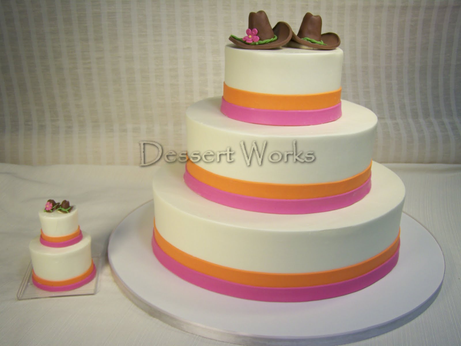 pink and orange wedding cake the tropical pink and orange colored rolled chocolate bands brought