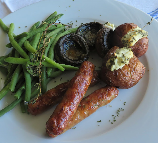 Roasted Sausages with Goat's Cheese Stuffed Baby Potatoes