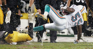 Check out the little droplets of water, you can see coming of the players and the field