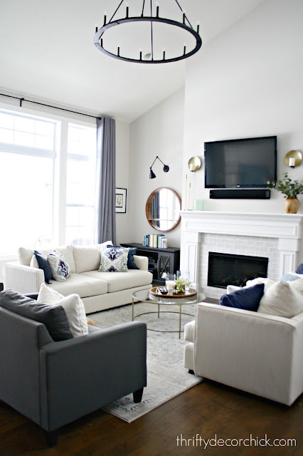 family room with pitched ceiling and big windows