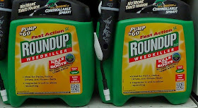 Image of two containers of Roundup herbicide