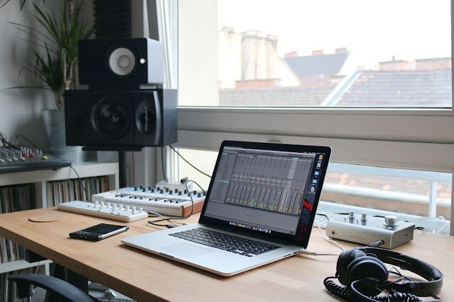 A Laptop With Music Production Equipment