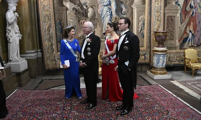 Crown Princess Victoria, Prince Daniel, Prince Carl Philip, Princess Sofia and Princess Christina. Diamond tiara. Blue, red and green dress